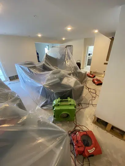Plastic containment and drying equipment set up in a Wake Forest house